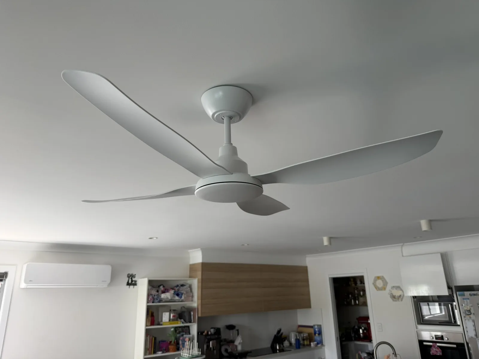 White three-blade fan, open-plan living