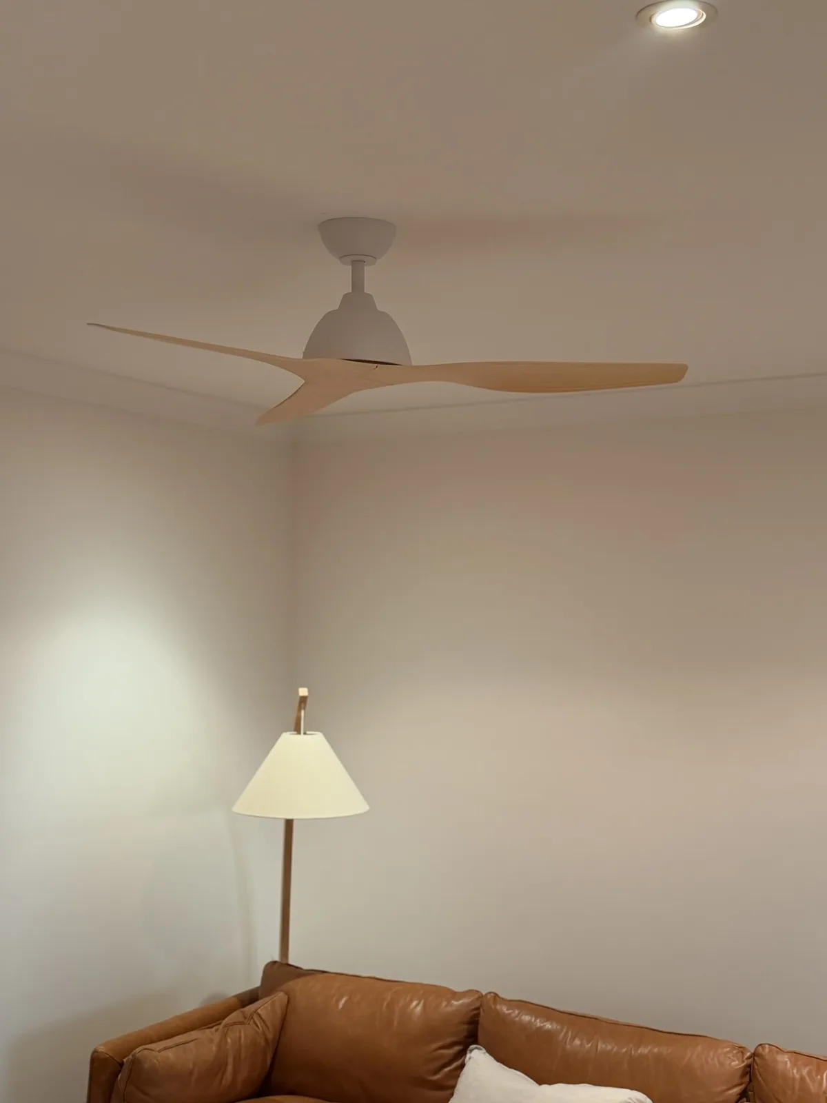 Timber-blade DC ceiling fan in a living room