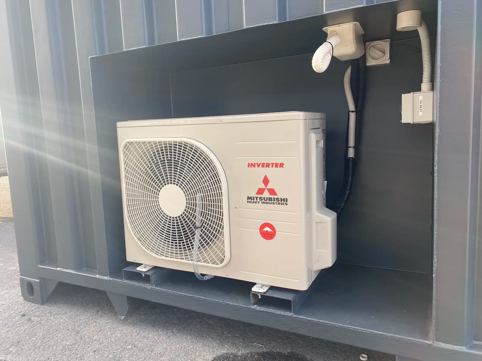 Shed install with a weatherproof isolator