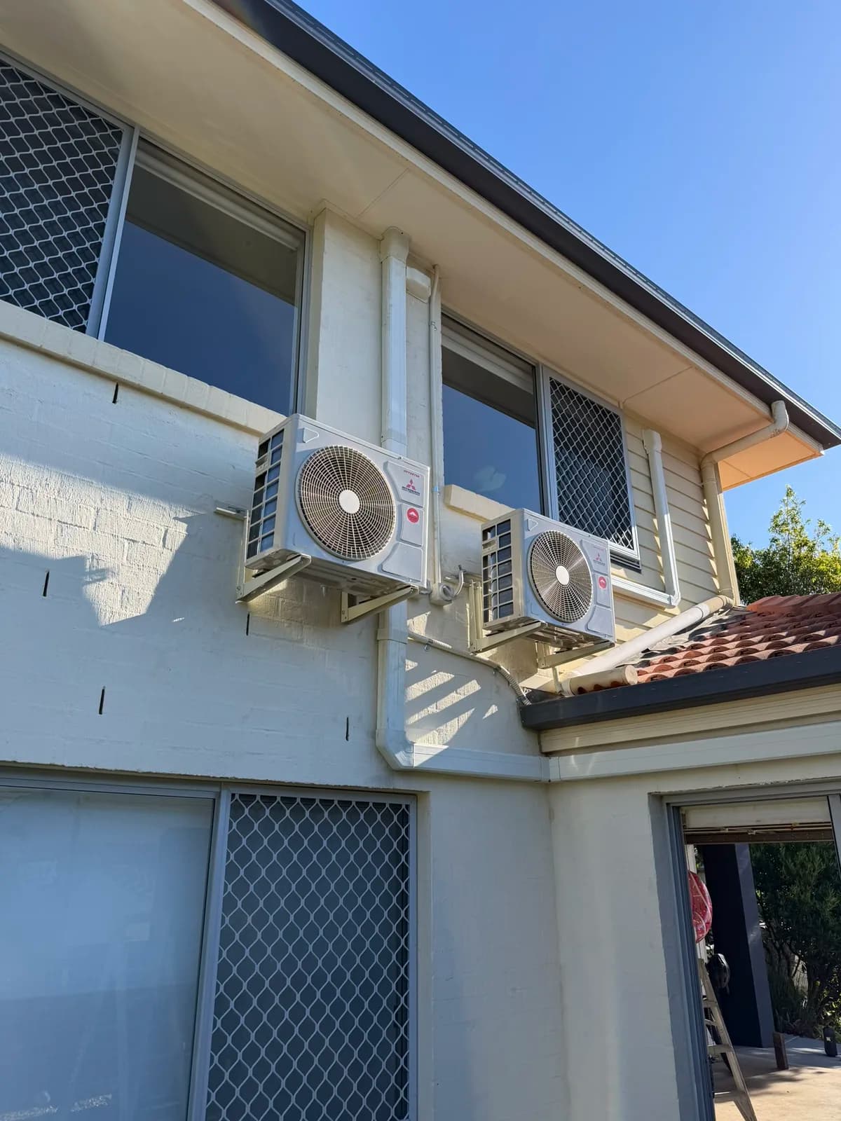 Two outdoor units on brackets, Wynnum